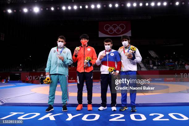 Silver medalist Haji Aliyev of Team Azerbaijan, gold medalist Takuto Otoguro of Team Japan and bronze medalists Gadzhimurad Rashidov of Russian...