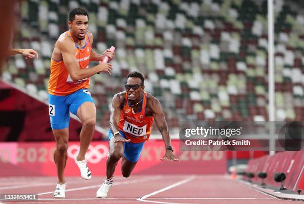 Liemarvin Bonevacia hands the baton off to teammate Terrence Agard of Team Netherlands in the Men's 4 x 400m Relay Final on day fifteen of the Tokyo...