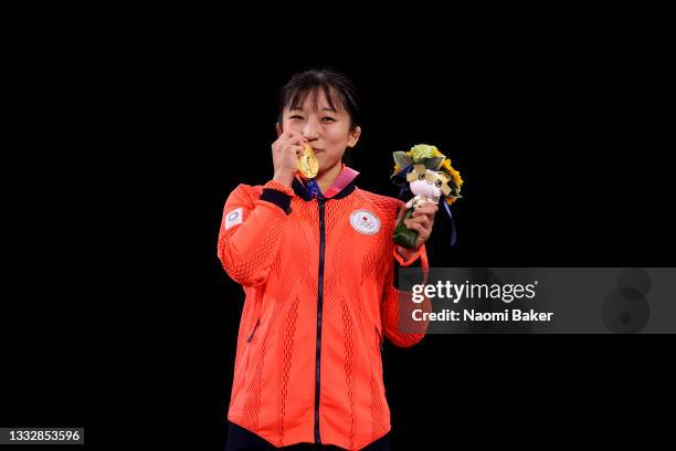 Gold medalist Yui Susaki of Team Japan poses with the gold medal during the medal ceremony for the Women's Freestyle 50kg on day fifteen of the Tokyo...