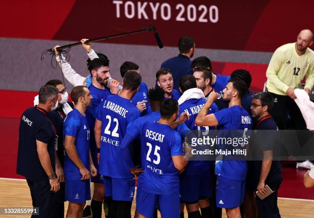 Team France is seen during a timeout in the Men's Gold Medal handball match between France and Denmark on day fifteen of the Tokyo 2020 Olympic Games...