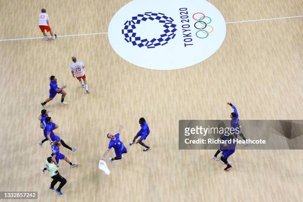 Team France celebrates defeating Team Denmark 25-23 to win the gold medal in Men's Handball on day fifteen of the Tokyo 2020 Olympic Games at Yoyogi...