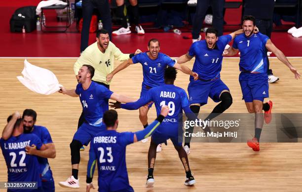 Team France celebrates defeating Team Denmark 25-23 to win the gold medal in Men's Handball on day fifteen of the Tokyo 2020 Olympic Games at Yoyogi...