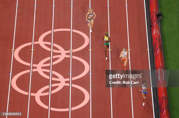 General view as Allyson Felix of Team United States leads the field in the Women's 4x400m Relay final on day fifteen of the Tokyo 2020 Olympic Games...