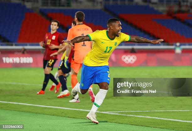 Malcom of Team Brazil celebrates after scoring their side's second goal during the Men's Gold Medal Match between Brazil and Spain on day fifteen of...