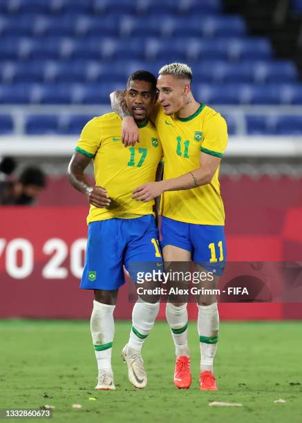 Malcom of Team Brazil celebrates with Antony after scoring their side's second goal during the Men's Gold Medal Match between Brazil and Spain on day...