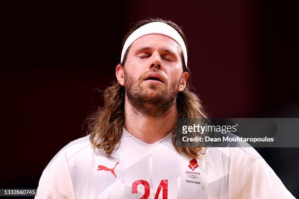 Mikkel Hansen of Team Denmark looks dejected after being defeated by Team France in the Men's Gold Medal Match on on day fifteen of the Tokyo 2020...