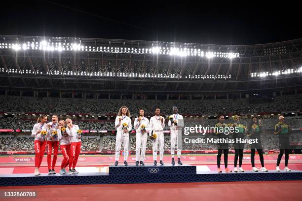 Team Poland, Team United States and Team Jamaica pose with their medals during the ceremony for the Women's 4 x 400m Relay Final on day fifteen of...