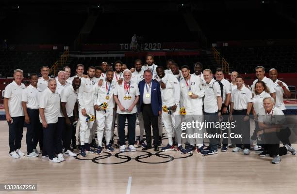 Team United States pose for photographs with their gold medals during the Men's Basketball medal ceremony on day fifteen of the Tokyo 2020 Olympic...