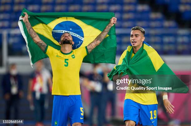 Reinier Jesus Carvalho and Douglas Luiz of Team Brazil celebrates their side's victory after the Men's Gold Medal Match between Team Brazil and Team...