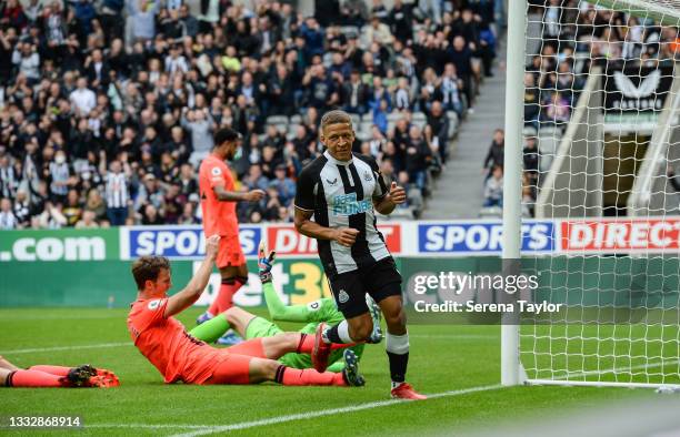 Dwight Gayle of Newcastle United FC scores his second goal past Norwich Goalkeeper Tim Krul during the Pre Season Friendly between Newcastle United...