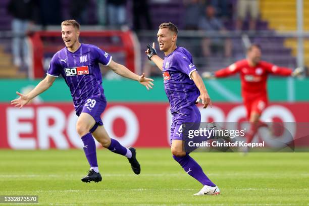 Sven Koehler of Osnabrueck celebrates the second goal with Davide Itter of Osnabrueck during the DFB Cup first round match between VfL Osnabrück and...