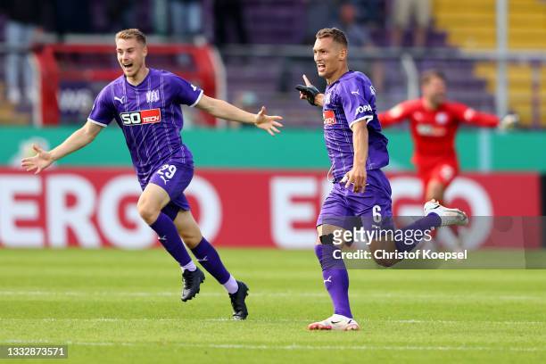 Sven Koehler of Osnabrueck celebrates the second goal with Davide Itter of Osnabrueck during the DFB Cup first round match between VfL Osnabrück and...