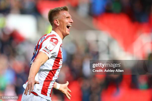 Sam Clucas of Stoke City celebrates scoring during the Sky Bet Championship match between Stoke City and Reading at Bet365 Stadium on August 07, 2021...