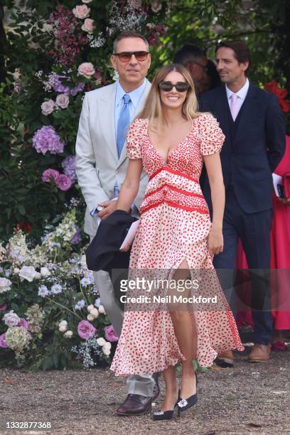 David Walliams and Keeley Hazell seen departing the wedding of Ant McPartlin and Anne-Marie Corbett at St Michael's Church in Heckfield on August 07,...