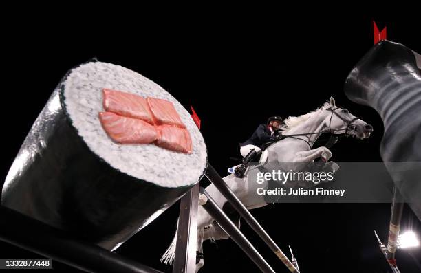 Simon Delestre of Team France riding Berlux Z competes during the Equestrian Jumping Team Qualifier on day fourteen of the Tokyo 2020 Olympic Games...