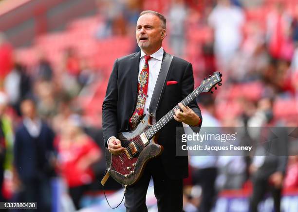 Thomas Sandgaard, owner of Charlton Athletic plays the guitar to the fans prior to the Sky Bet League One match between Charlton Athletic and...