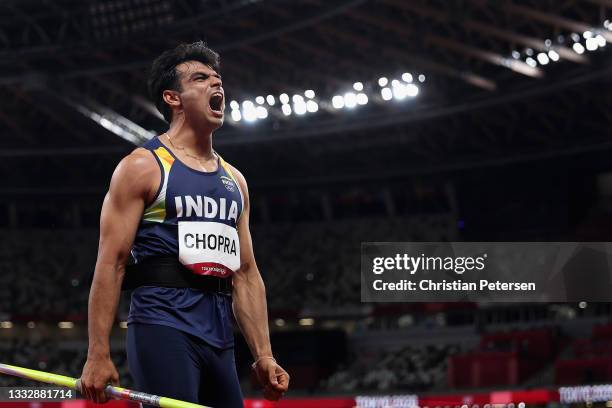 Neeraj Chopra of Team India reacts as he competes in the Men's Javelin Throw Final on day fifteen of the Tokyo 2020 Olympic Games at Olympic Stadium...