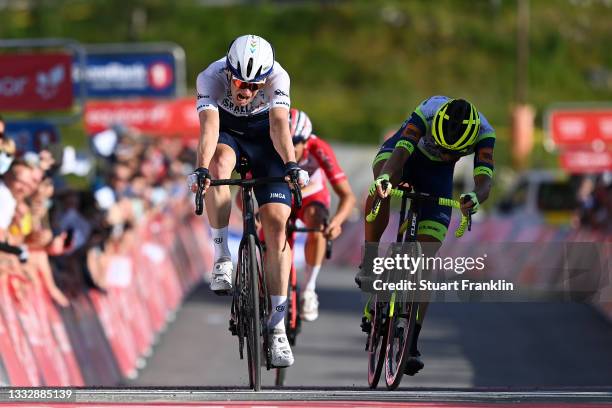 Ben Hermans of Belgium and Team Israel Start-Up Nation celebrates at finish line as stage winner ahead of Christian Eiking Odd of Norway and Team...