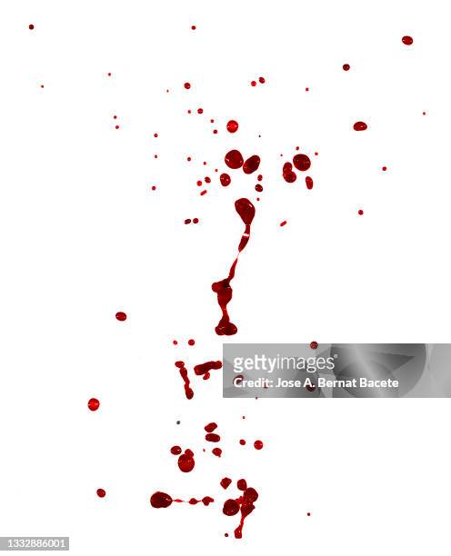 full frame of splashes and drops of red liquid in the form of blood, on a white background. - blood stock pictures, royalty-free photos & images