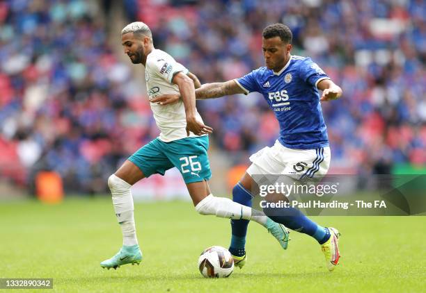 Riyad Mahrez of Manchester City battles for possession with Ryan Bertrand of Leicester City during The FA Community Shield Final between Manchester...