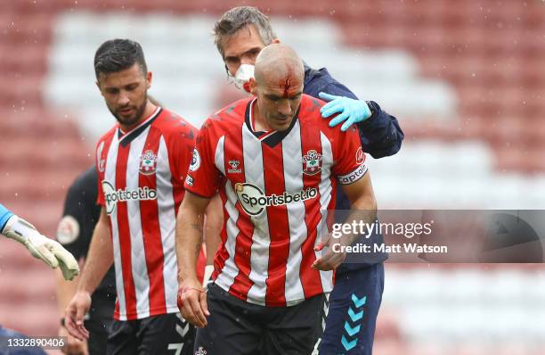 Oriol Romeu of Southampton with a head injury during the pre season friendly match between Southampton FC and Athletic Club at St Mary's Stadium on...