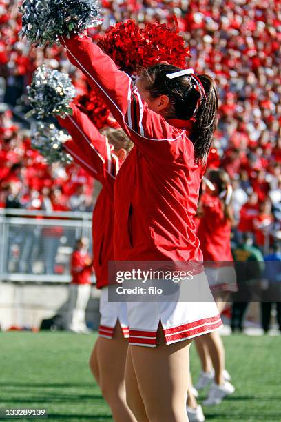 cheerleaders - college cheerleaders stock pictures, royalty-free photos & images