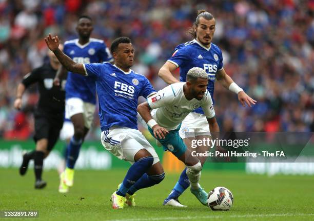 Riyad Mahrez of Manchester City is fby Ryan Bertrand of Leicester City during The FA Community Shield Final between Manchester City and Leicester...