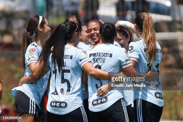Maria Sanchez of Tigres celebrates with teammates after scoring the second goal of her team during the match between Atlas and Tigres as part of the...