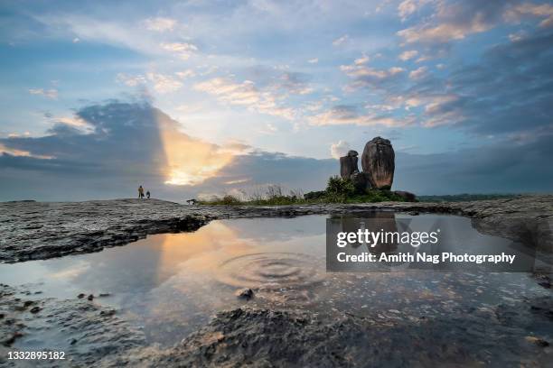 twilight at thimmappana betta twin-towers - bangalore stock pictures, royalty-free photos & images