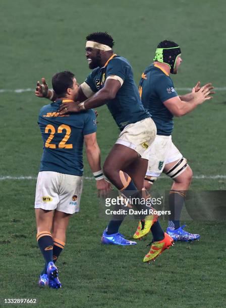 Siya Kolisi of South Africa celebrates with teammate Morne Steyn after winning the Test Series between South Africa and British & Irish Lions at Cape...