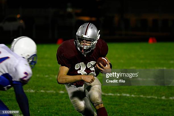 running back - american football player back stock pictures, royalty-free photos & images