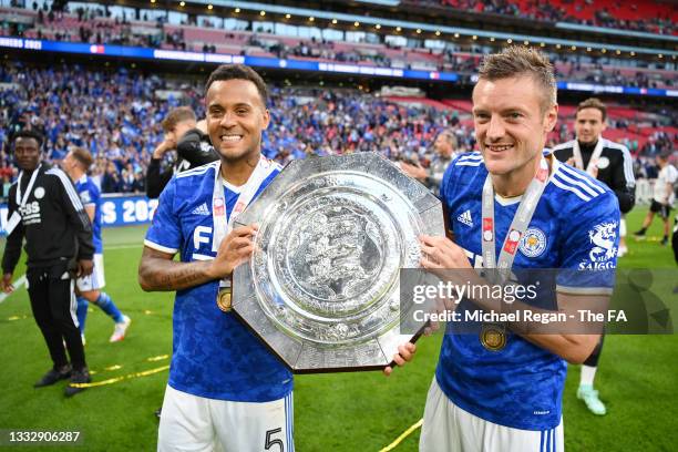 Jamie Vardy and Ryan Bertrand of Leicester City pose with The FA Community Shield following victory in The FA Community Shield Final between...