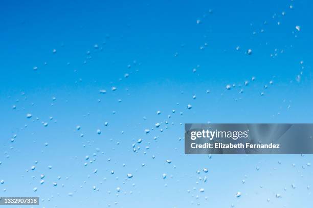 raindrops on window - windows surface stock pictures, royalty-free photos & images