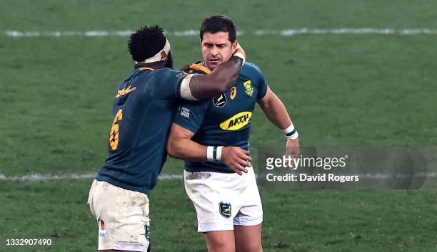 Morne Steyn of the South Africa Springboks, who scored the late winning penalty, celebrates with his captain Siya Kolisi during the 3rd test match...