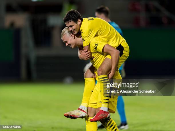 Erling Haaland of Dortmund celebrates the third goal for his team with Giovanni Reyna of Dortmund during the DFB Cup first round match between SV...