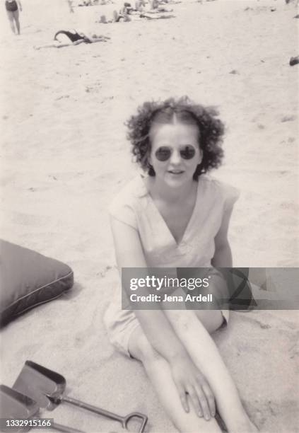 vintage woman on beach vacation, vintage photograph from the 1920s 1930s - 1930s beach stock pictures, royalty-free photos & images