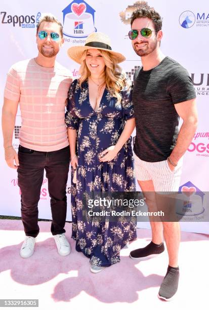 Lance Bass, Pandora Todd, and Michael Turchin arrive at the 5th Annual World Dog Day at West Hollywood Park on August 07, 2021 in West Hollywood,...