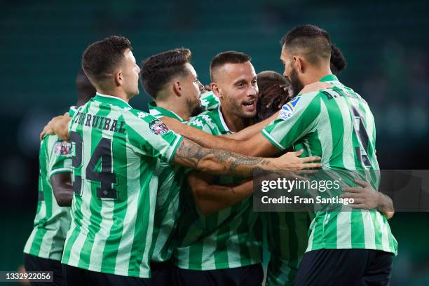 Rodri Sanchez of Real Betis celebrates scoring a goal with team mates during a friendly match between Real Betis and AS Roma at Estadio Benito...