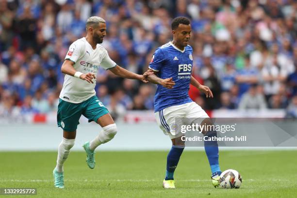 Riyad Mahrez of Manchester City and Ryan Bertrand of Leicester City during the The FA Community Shield between Manchester City and Leicester City at...