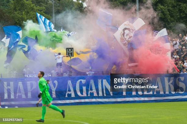 Fans of SV Babelsberg 03 fire up bengalo / pyro / firework prior the DFB Cup first round match between SV Babelsberg 03 and SpVgg Greuther Fuerth on...