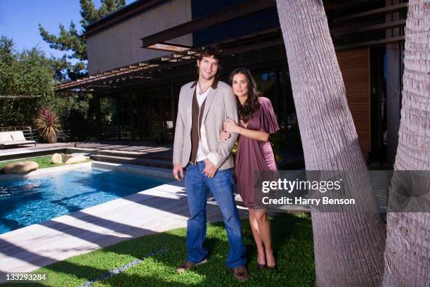 Actors Ashton Kutcher and Demi Moore are photographed at home for Architectural Digest on October 19, 2006 in Beverly Hills, California.