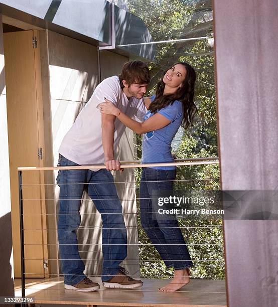 Actors Ashton Kutcher and Demi Moore are photographed at home for Architectural Digest on October 19, 2006 in Beverly Hills, California.