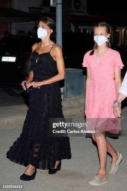 Queen Letizia of Spain and Crown Princess Leonor of Spain leave the Ola de Mar restaurant on August 07, 2021 in Palma de Mallorca, Spain.