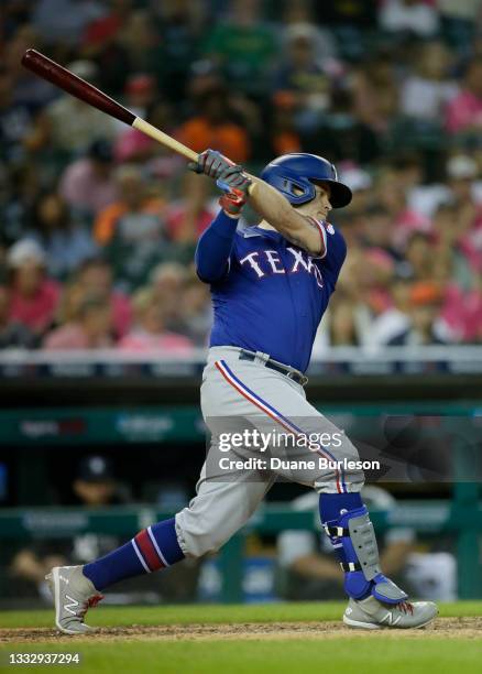 Brock Holt of the Texas Rangers strikes out during the eighth inning of a game against the Detroit Tigers at Comerica Park on July 21 in Detroit,...