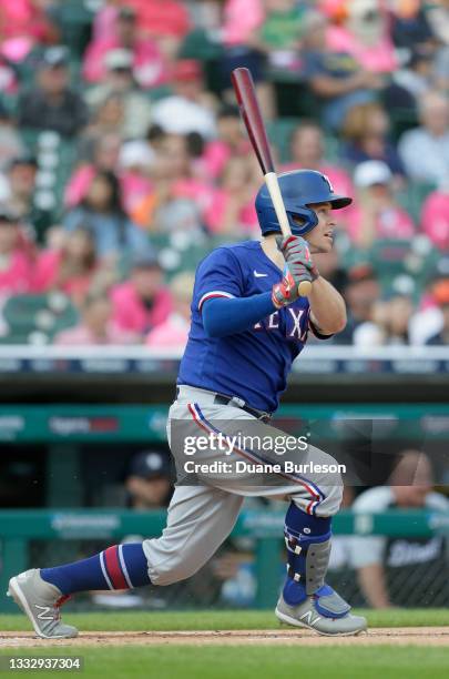 Brock Holt of the Texas Rangers grounds out during the first inning of a game against the Detroit Tigers at Comerica Park on July 21 in Detroit,...