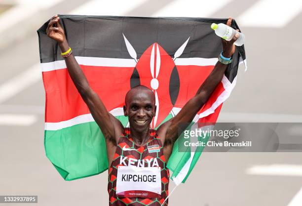 Eliud Kipchoge of Team Kenya celebrates winning the gold medal in the Men's Marathon Final on day sixteen of the Tokyo 2020 Olympic Games at Sapporo...