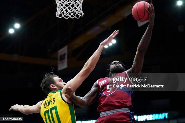 Earl Clark of Tri State attempts a shot while being guarded by Spencer Hawes of the Ball Hogs during BIG3 - Week Six at Credit Union 1 Arena on...