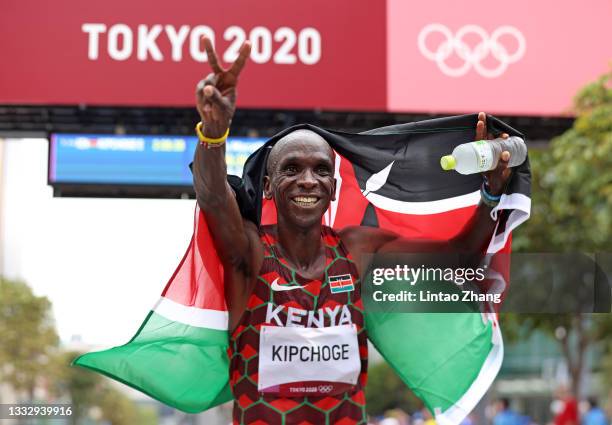 Eliud Kipchoge of Team Kenya celebrates after winning the gold medal in the Men's Marathon Final on day sixteen of the Tokyo 2020 Olympic Games at...