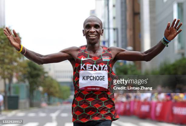 Eliud Kipchoge of Team Kenya celebrates after winning the gold medal in the Men's Marathon Final on day sixteen of the Tokyo 2020 Olympic Games at...
