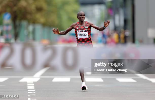 Eliud Kipchoge of Team Kenya is about to cross the finish line during the Men's Marathon Final on day sixteen of the Tokyo 2020 Olympic Games at...